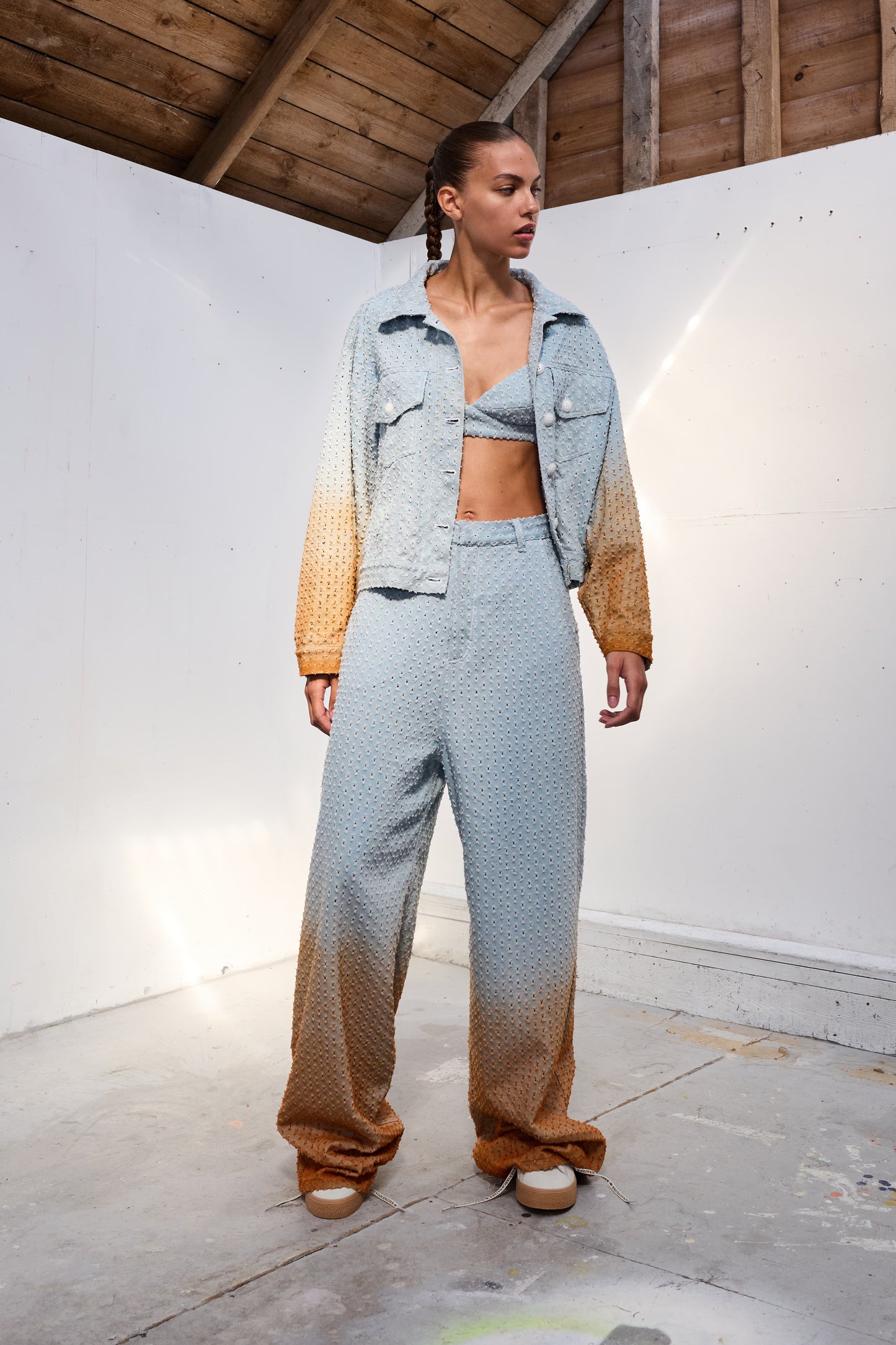 Perforated Jeans with Orange Gradient