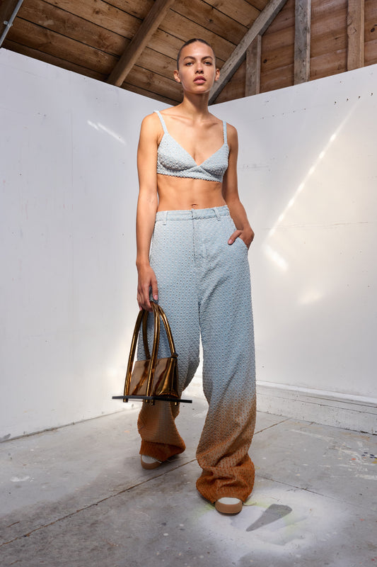Perforated Jeans with Orange Gradient